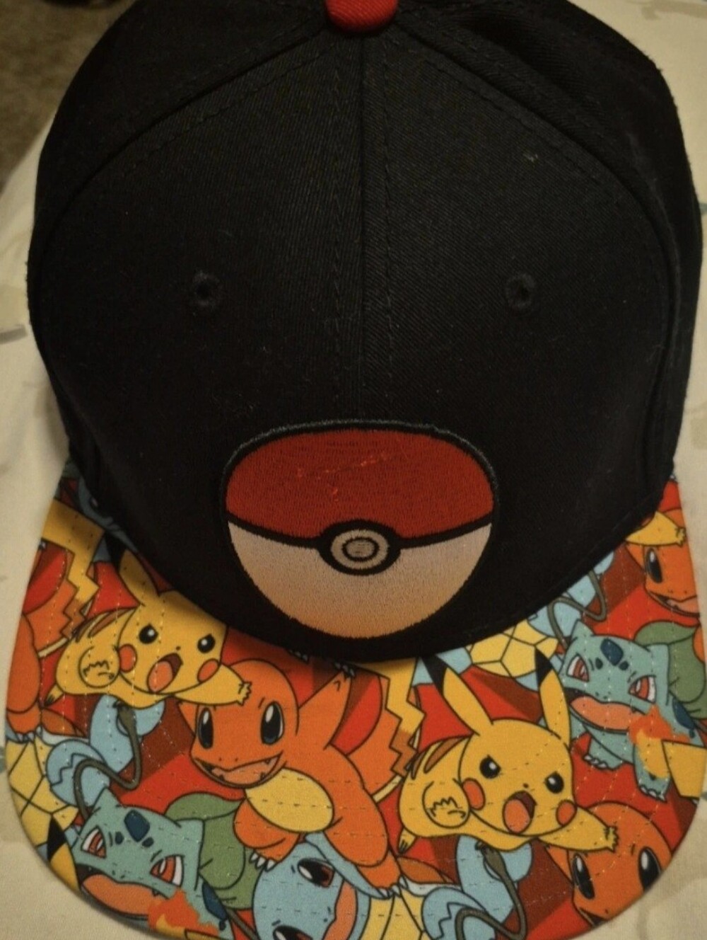 Black Pokemon Snapback Hat with Pokeball Patch